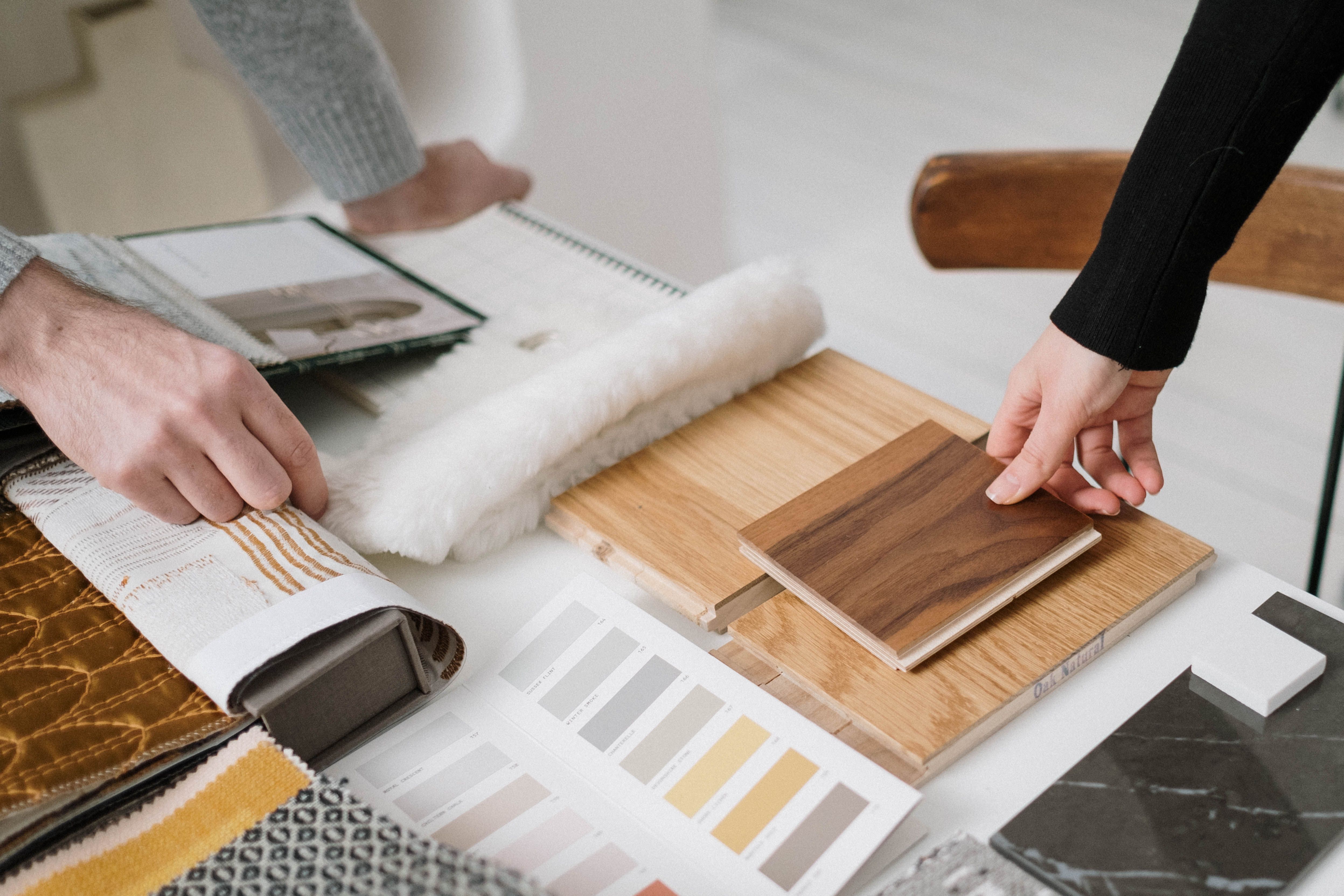 Interior material samples and design references on a work table